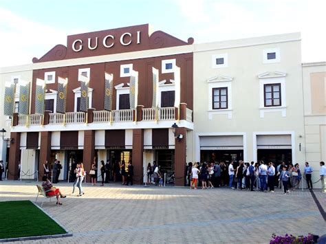 sicilia outlet village prezzi gucci|gucci sicilia.